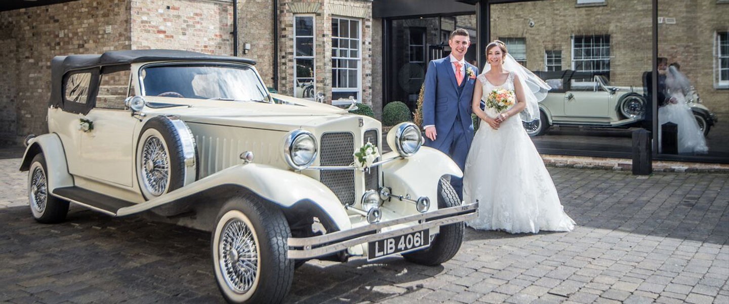 Married Couple and Vintage Car